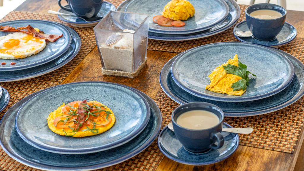 Restaurante 6 al lado de la piscina con deliciosa gastronomia caribeña e internacional